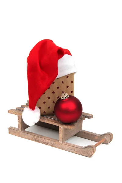 Christmas gift on sledge — Stock Photo, Image
