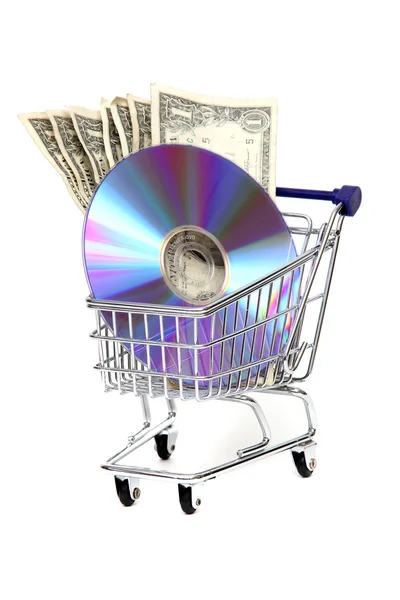 Carrello dello shopping con dollari e DVD — Foto Stock