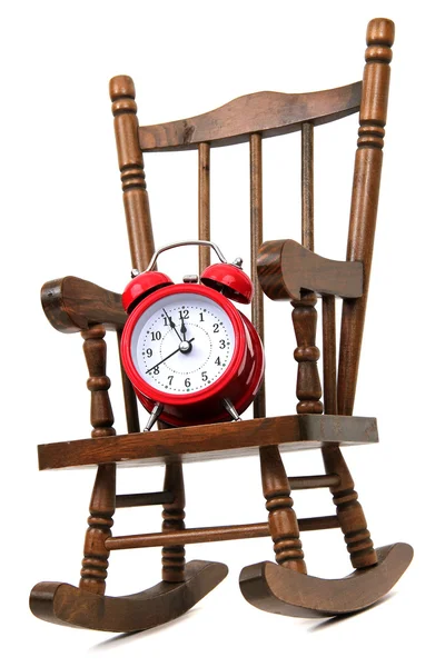 Vieille chaise à bascule en bois et sonnette d'alarme rouge sur blanc — Photo