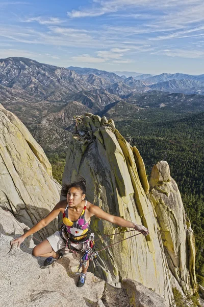 stock image Rock climber clinging to a cliff.