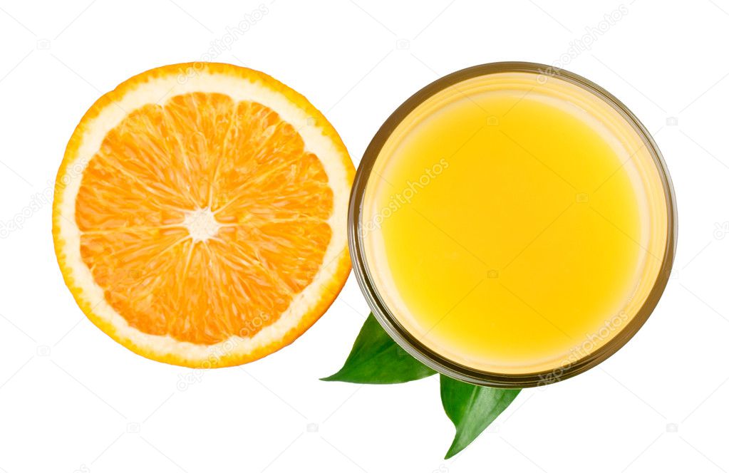 Half orange and juice with leaves from top