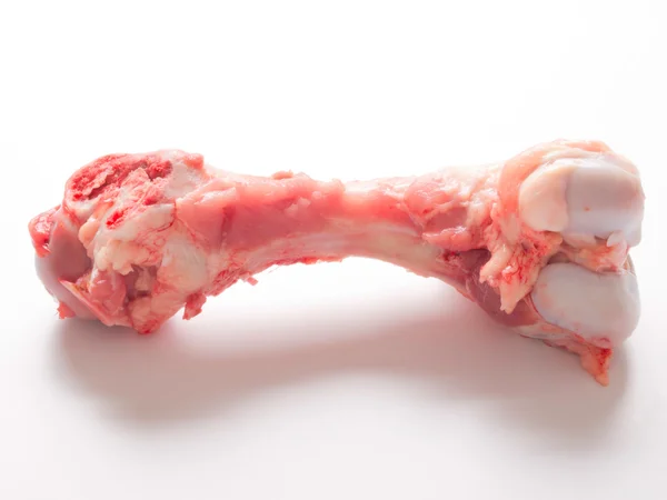 Único osso de porco no branco — Fotografia de Stock