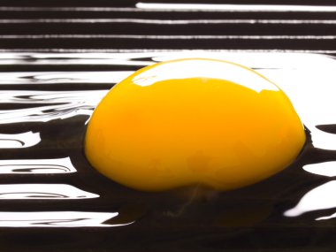 Raw egg on a grill