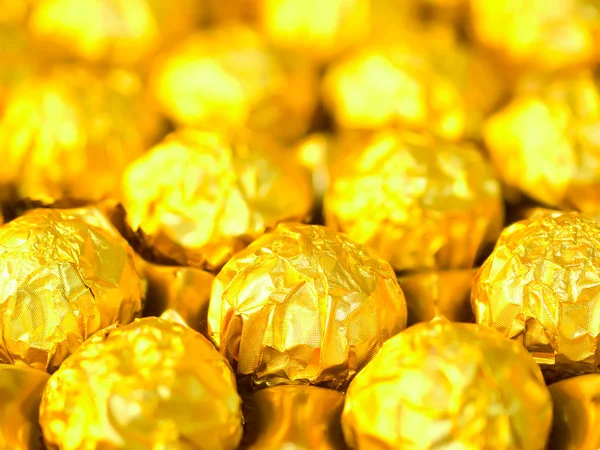 stock image Candy in gold wrappers