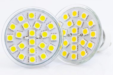 Two LED bulbs with warm and cold light clipart