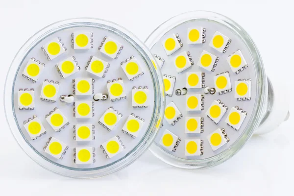 Duas lâmpadas LED com luz quente e fria — Fotografia de Stock