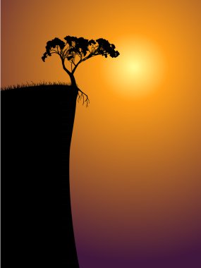 Single lonely tree on a precipice clipart