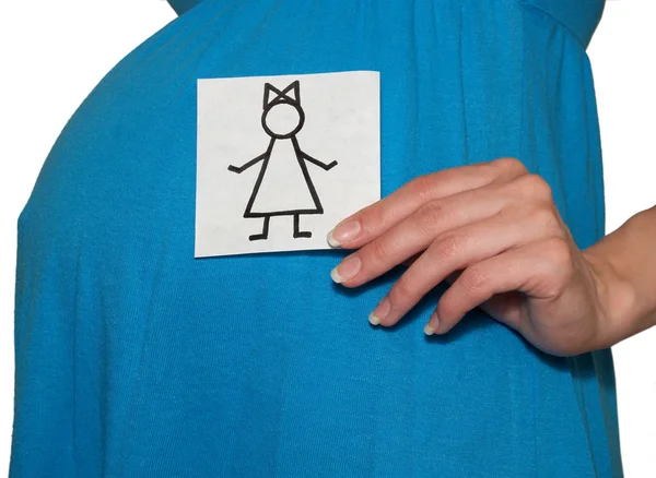 A mulher grávida mantém o desenho da menina — Fotografia de Stock