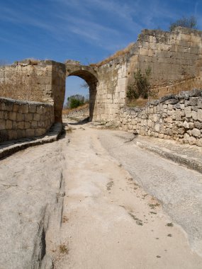 Crimea. Street of an ancient fortified city of Chufut-Kale clipart