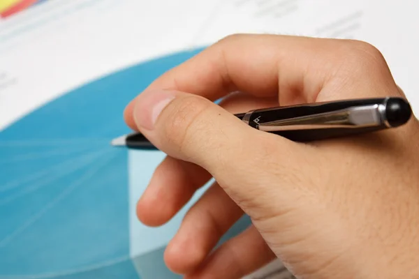 Diagram and hand with pen — Stock Photo, Image
