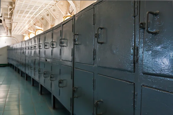 Gray metal lockers in row — Stock Photo, Image