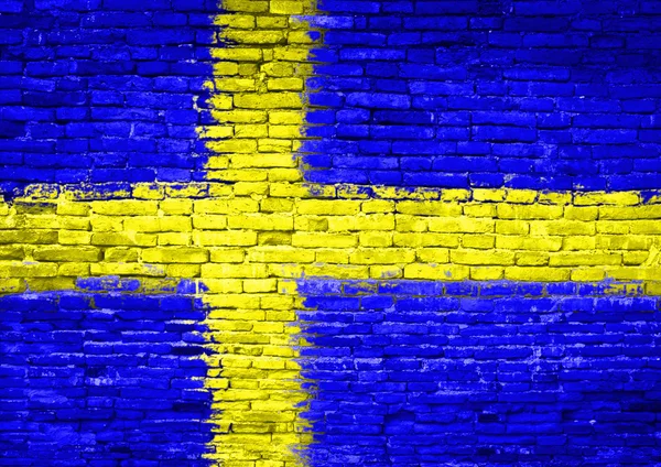 Svédország lobogója festett falra — Stock Fotó