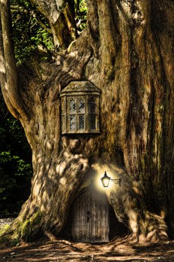 Fantasy fairytale miniature house in tree in forest clipart