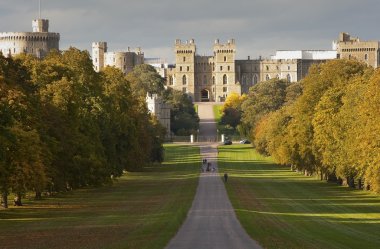 Windsor Castle viewed along Long Walk in Windsor Great Park in E clipart