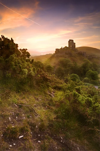 Romantic fantasy magical castle ruins against stunning vibrant s — Stock Photo, Image