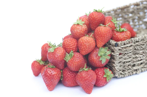 Fresh ripe juicy strawberries in rustic basket isolated on white — Stock Photo, Image