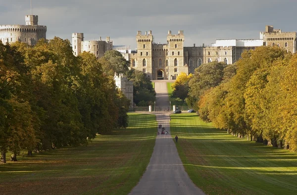 Windsor Castle viewed along Long Walk in Windsor Great Park in E Stock Photo