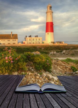 Creative concept of lighthouse on rocky cliffs sunset coming out clipart