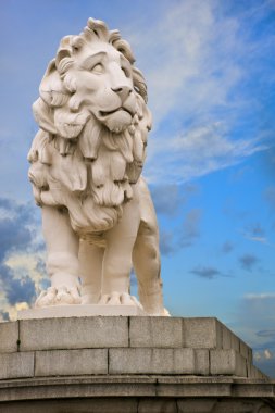 Close up of South Bank Lion statue on Westminster Bridge in London clipart