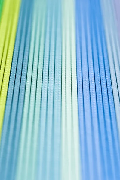 Sığ derinlik-in tarla ile dokulu renkli kağıt arka plan — Stok fotoğraf