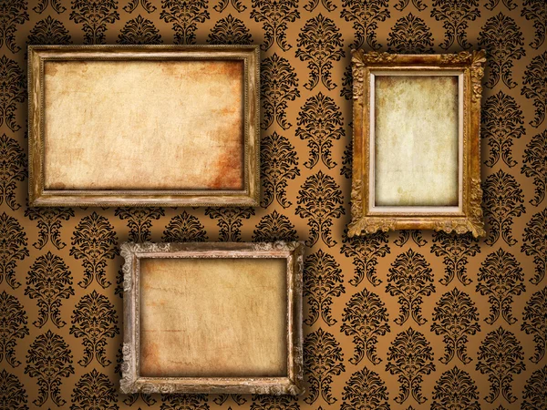 Molduras vintage douradas no fundo do papel de parede damasco com grunge — Fotografia de Stock