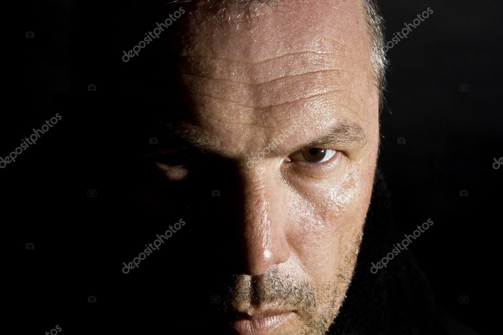 Low key portrait of menacing looking caucasian man Stock Photo by ...