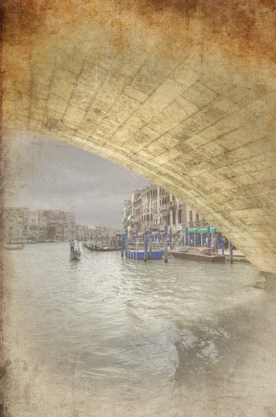 stock image Retro grunge photo of Low view through Rialto Bridge along Grand