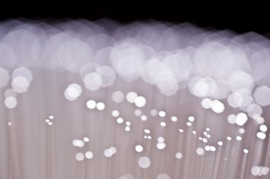 Fiber optik geniş bant teknolojisi konsept bokeh arka plan bulanık.