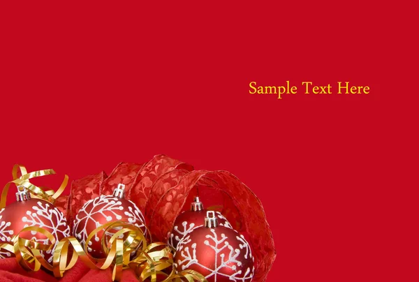 Christmas Decorations red baubles and gold ribbons — Stock Photo, Image