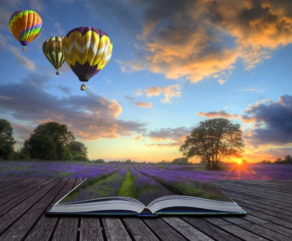 Hot air balloons lavender landscape magic book pages — Stock Photo, Image