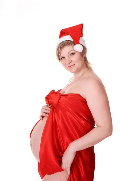 Μια έγκυος γυναίκα ντυμένη με τον Άγιο Βασίλη — Φωτογραφία Αρχείου