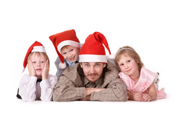 Rodziny w Boże Narodzenie czapki — Zdjęcie stockowe