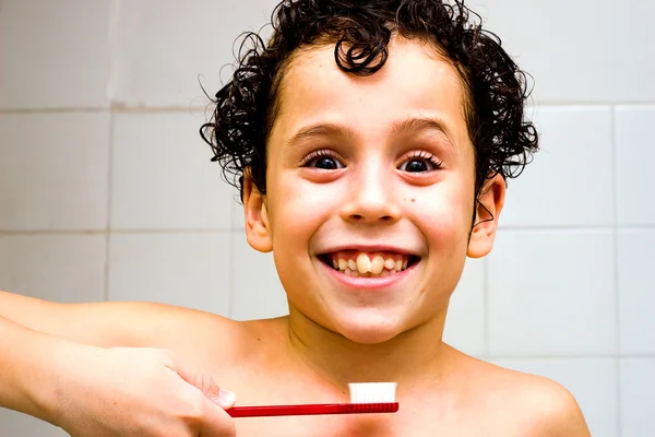 Cute smiling boy with toothbrush — Stock Photo, Image