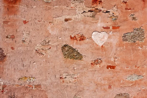 Coração na parede de pedra velha — Fotografia de Stock