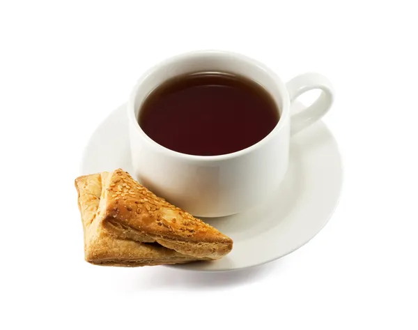 Xícara de chá e biscoito fresco — Fotografia de Stock
