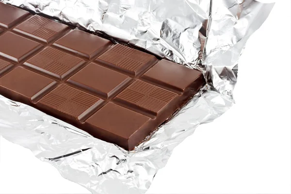 Barra de chocolate con leche en papel de aluminio —  Fotos de Stock