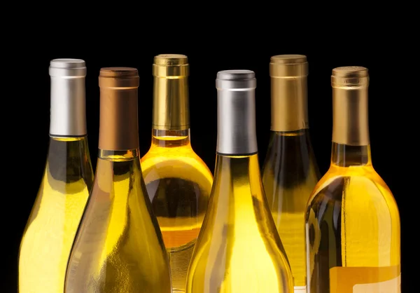 White Wine bottles on black — Stock Photo, Image