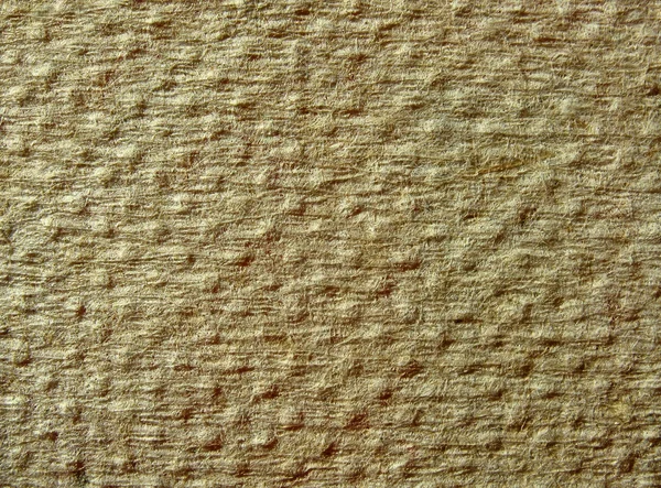 Textur aus gelb faserig gepunktetem Papier — Stockfoto