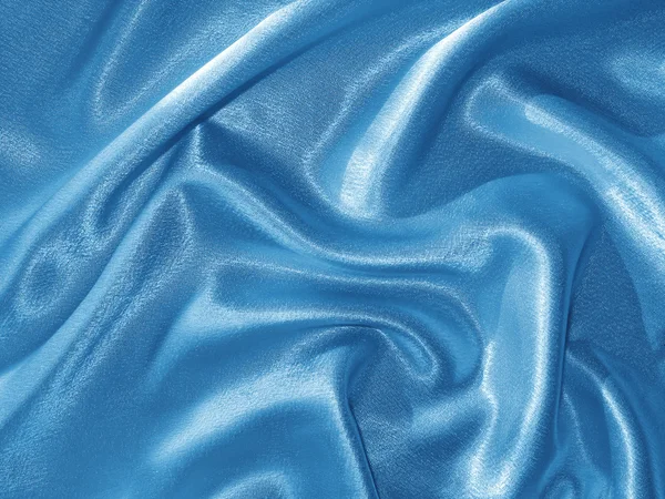 Gefalteter (drapierter) blauer Satin — Stockfoto