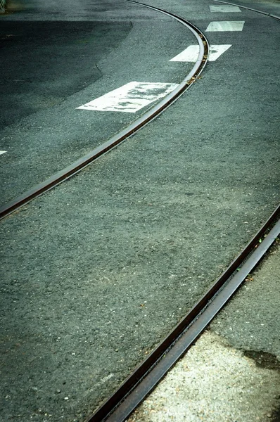 Křivka na silnici s železniční — Stock fotografie