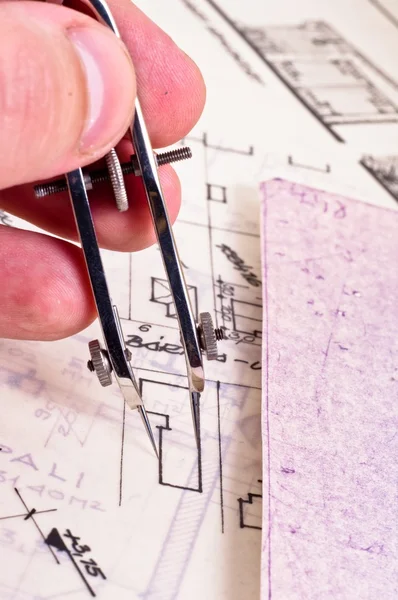 Fingers of an architect drawing a new home — Stock Photo, Image