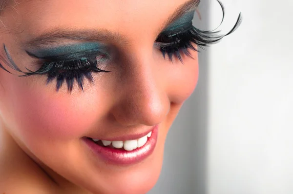 Closeup of a pretty girl with extreme makeup — Stock Photo, Image