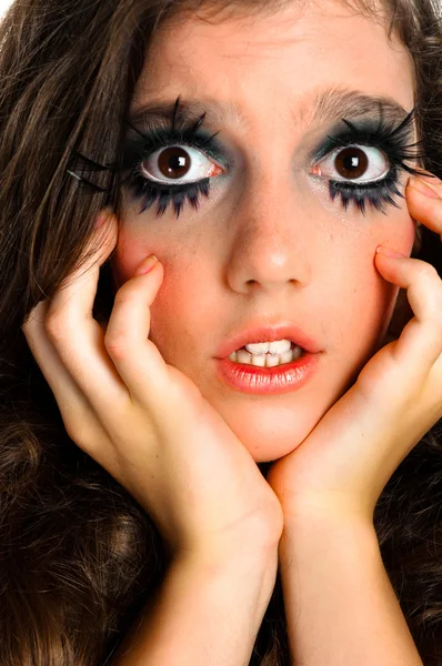 Livrädd flicka i extrem makeup — Stockfoto