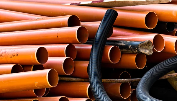 Orange and black pipes — Stock Photo, Image