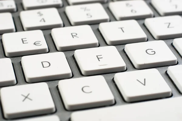 Closeup of a white clean keyboard — Stock Photo, Image