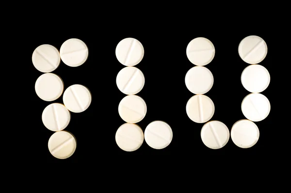 Flu word made out of medical pills — Stock Photo, Image