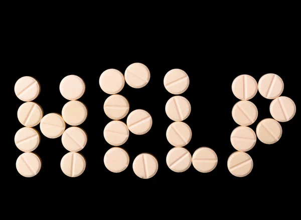 Help sign made out of pills — Stock Photo, Image