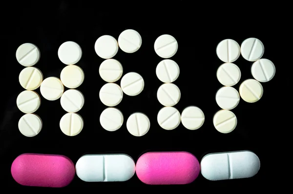 Help sign made out of pills — Stock Photo, Image