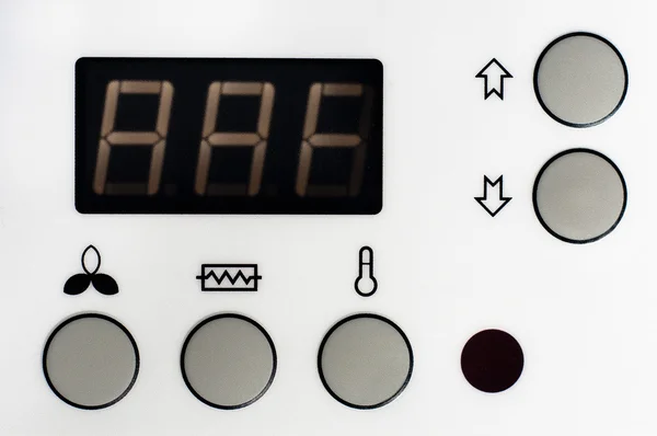 Close-up van een thermostaat met grote knoppen en scherm — Stockfoto