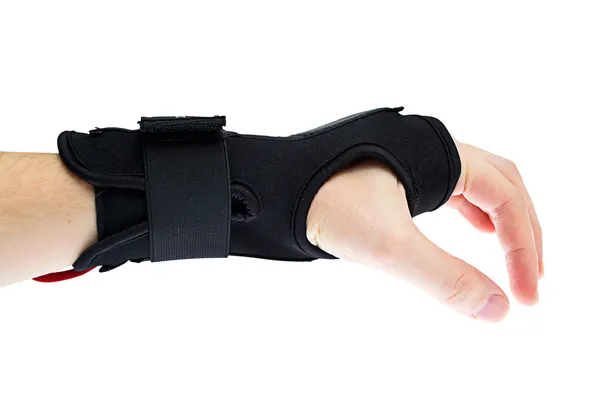 stock image Wrist support with hand isolated on white.